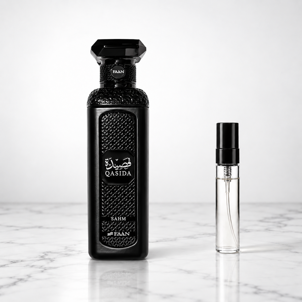 Qasida Sahm by FAAN perfume bottle with sample decant on white marble
