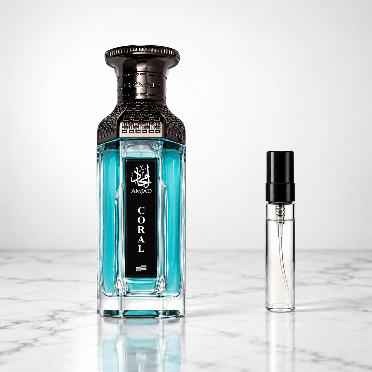 Amjad Coral by FAAN perfume bottle with sample decant on white marble