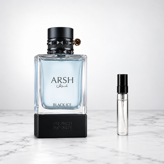 Arsh Black Ice by French Avenue perfume bottle beside a sample decant on white marble