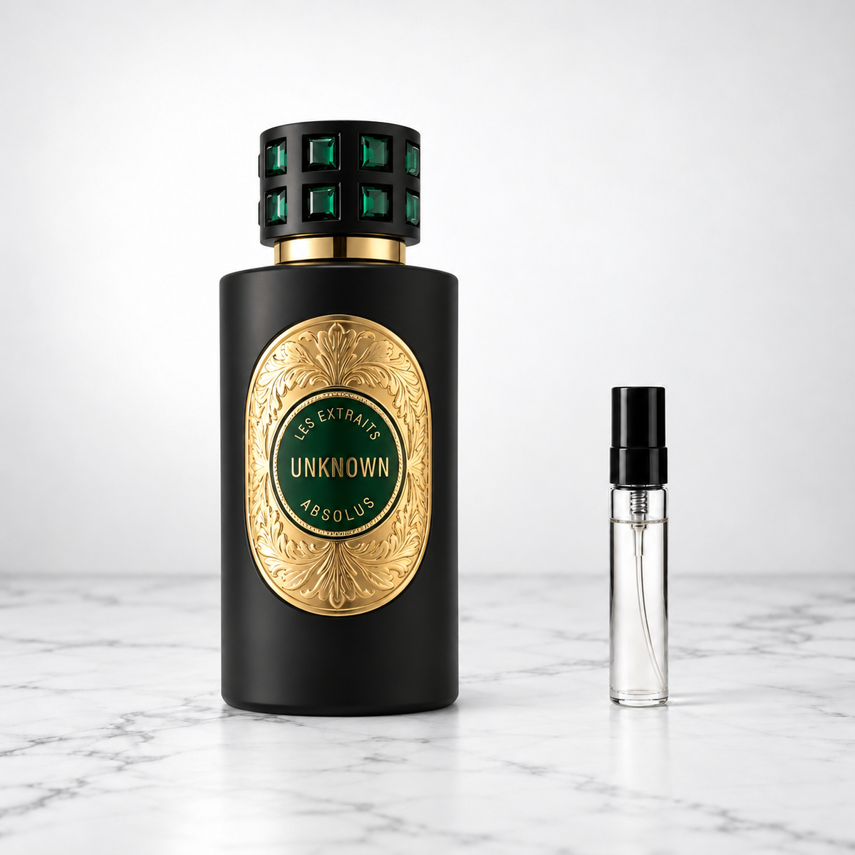 Unknown by French Avenue perfume bottle beside a sample decant on white marble