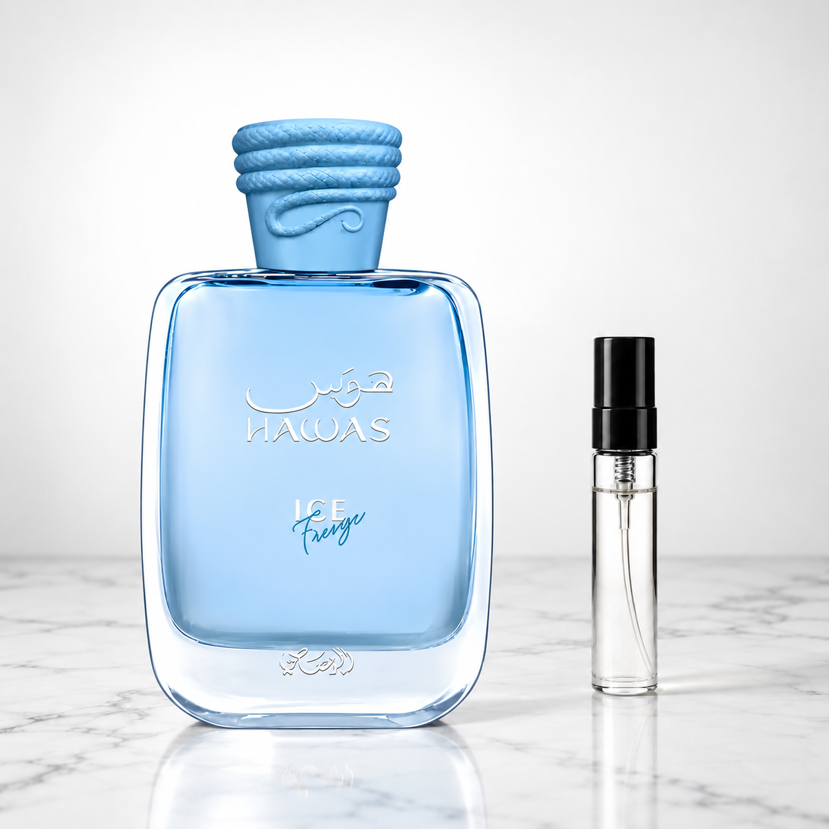 Hawas Ice Freeze by Rasasi perfume bottle with sample decant on white marble