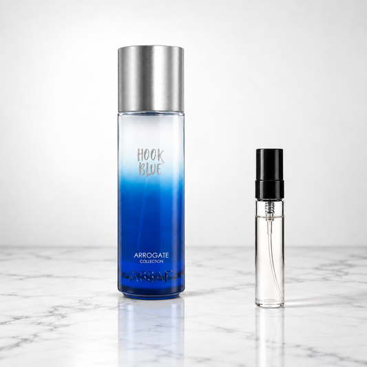 Hook Blue by Assaf perfume bottle with sample decant on white marble