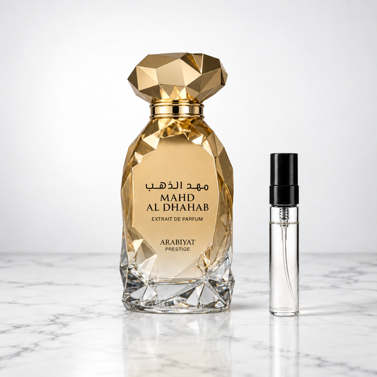 mahd al dhahab extrait by Arabiyat Prestige with a 5ml decant on white marble