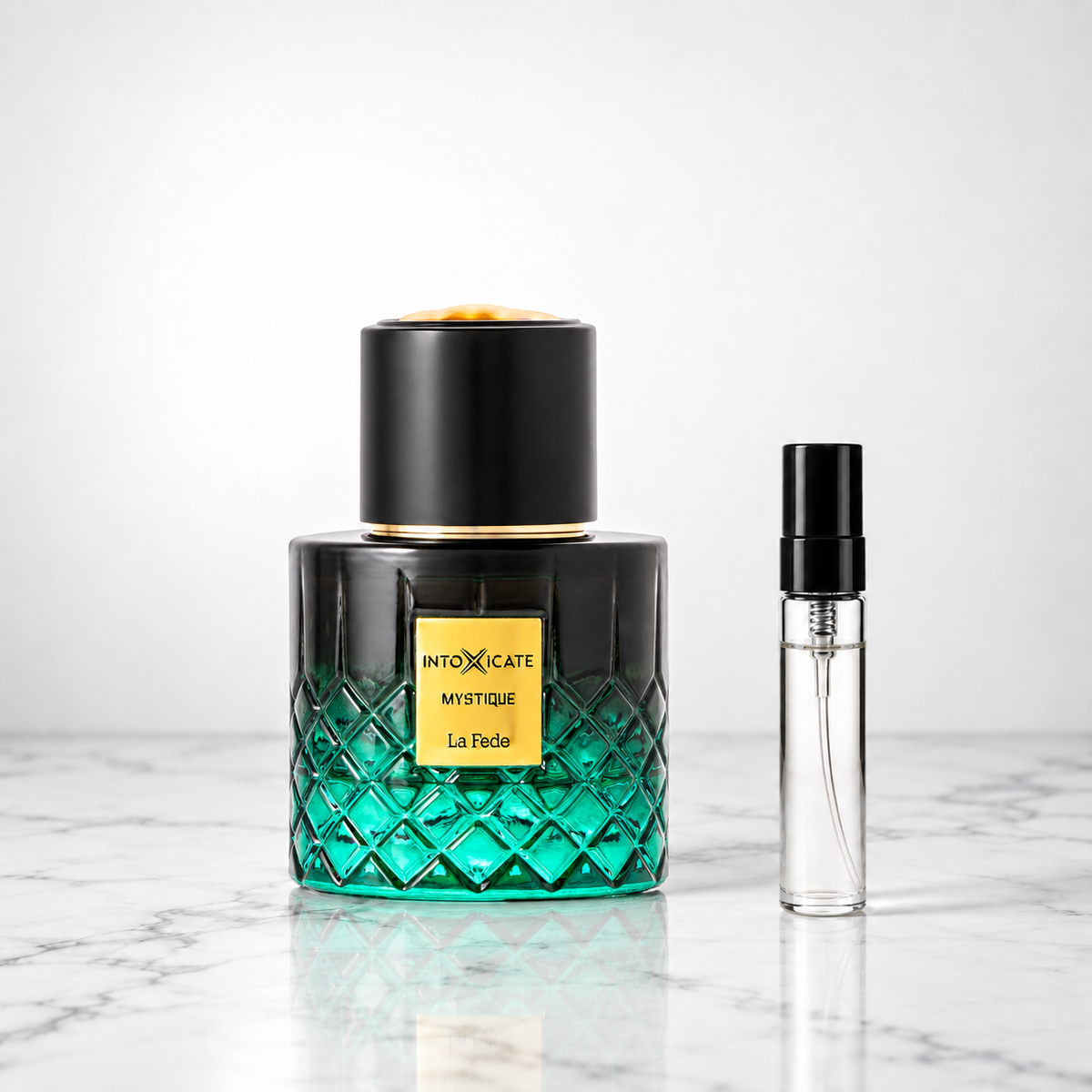 mystique perfume bottle with sample decant on marble