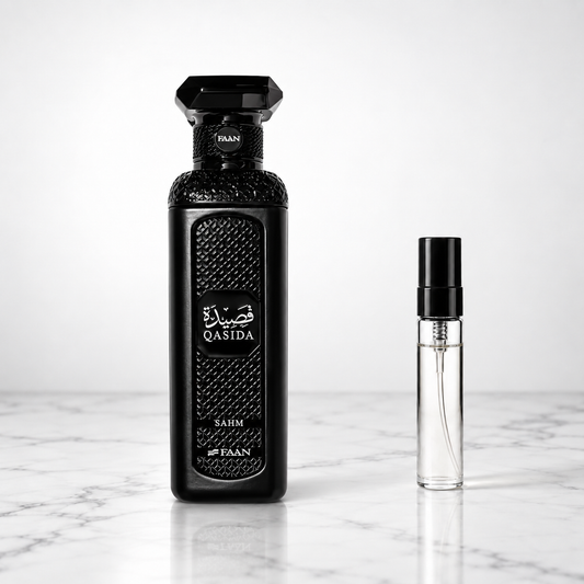 Qasida Sahm by FAAN perfume bottle with sample decant on white marble