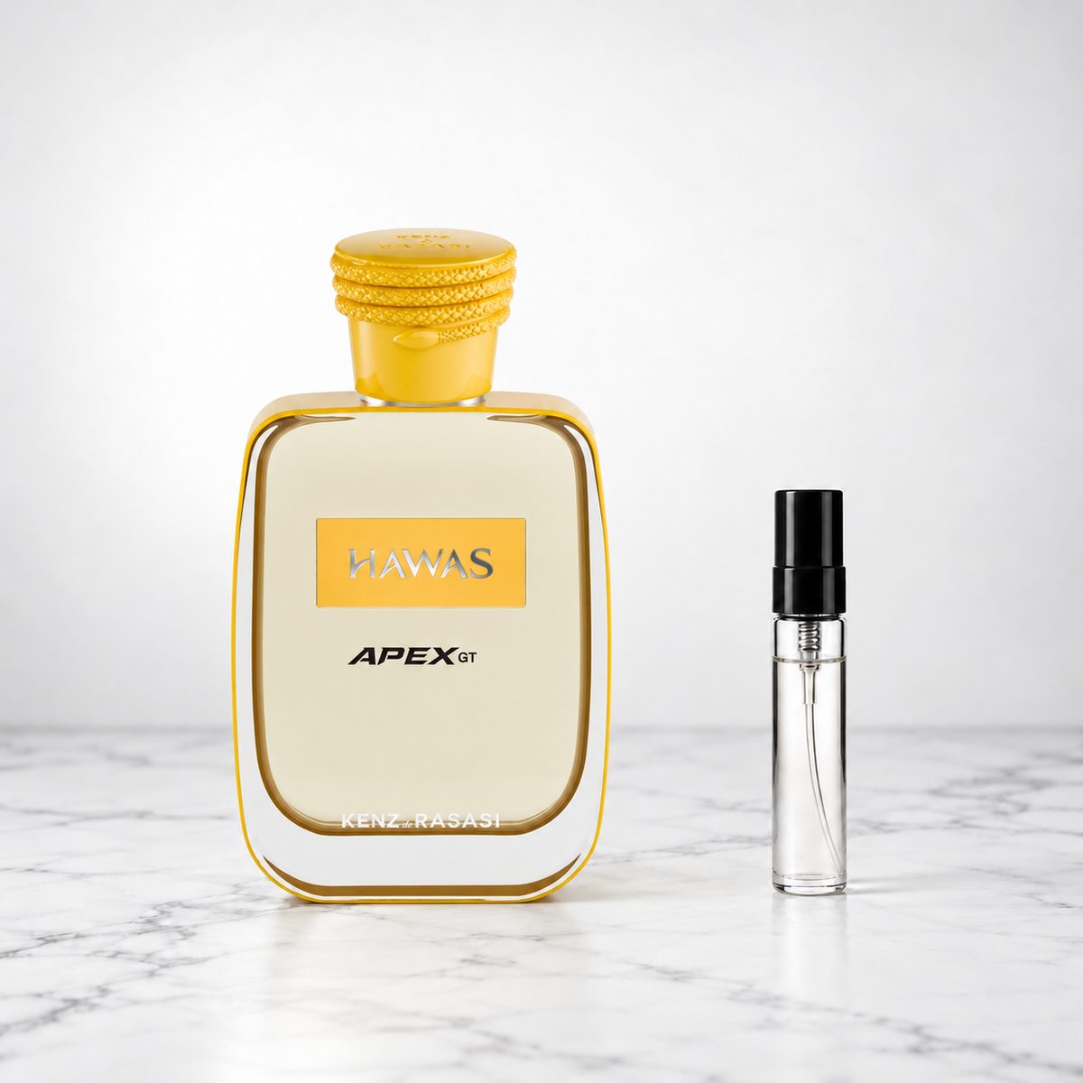 Hawas Apex GT by Rasasi perfume bottle beside a sample decant on white marble