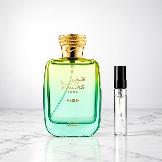 Hawas Verde by Rasasi bottle beside a perfume sample decant on marble