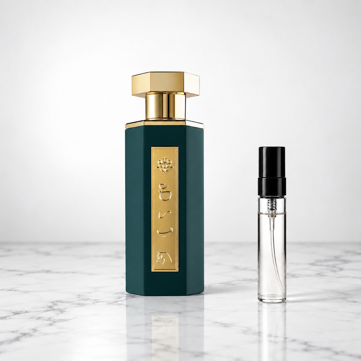 REEF Arabs of Obaiah perfume bottle with a clear sample decant on white marble