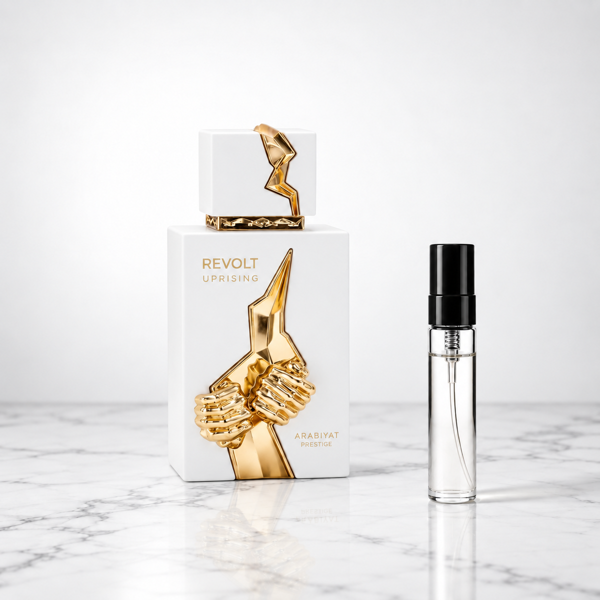 revolt perfume bottle with sample decant on marble